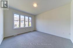Main Floor Primary Bedroom - 