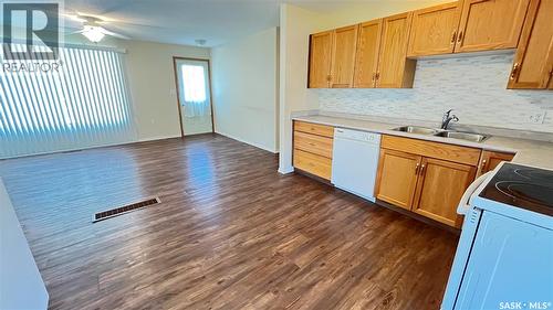 117 Herbert Street, Maple Creek, SK - Indoor Photo Showing Kitchen With Double Sink