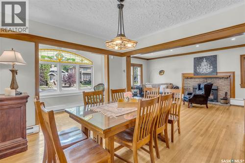 3120 Rae Street, Regina, SK - Indoor Photo Showing Dining Room With Fireplace
