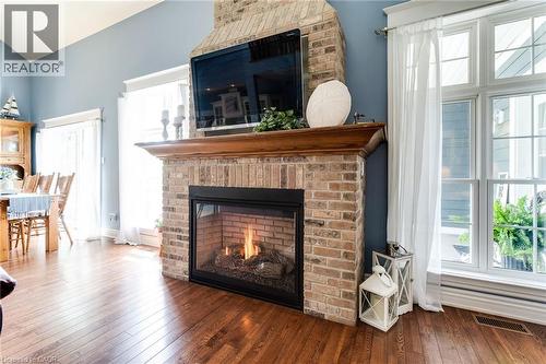 1026 Beach Boulevard, Hamilton, ON - Indoor Photo Showing Living Room With Fireplace