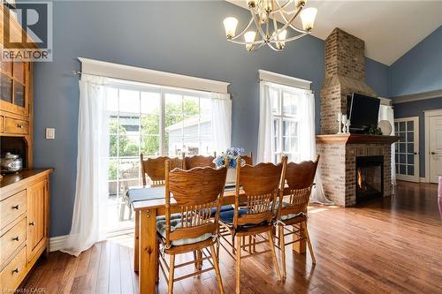 1026 Beach Boulevard, Hamilton, ON - Indoor Photo Showing Dining Room With Fireplace