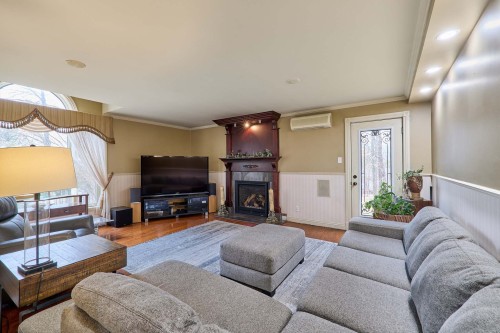 Salon - 832 Rue Des Verseaux, Prévost, QC - Indoor Photo Showing Living Room With Fireplace