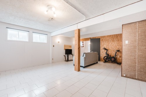 Family Room - 5655 Rue De Parme, Laval (Auteuil), QC - Indoor
