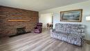 523 8Th Street, Cranbrook, BC  - Indoor Photo Showing Living Room With Fireplace 