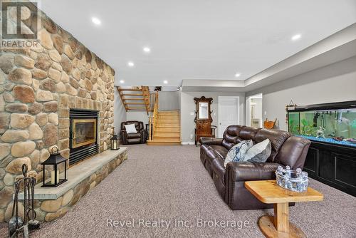 7190 93 Highway, Tiny, ON - Indoor Photo Showing Living Room With Fireplace