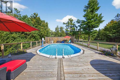 7190 93 Highway, Tiny, ON - Outdoor With Above Ground Pool With Deck Patio Veranda