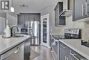 2621 Makowsky Crescent, Regina, SK  - Indoor Photo Showing Kitchen With Stainless Steel Kitchen With Double Sink With Upgraded Kitchen 