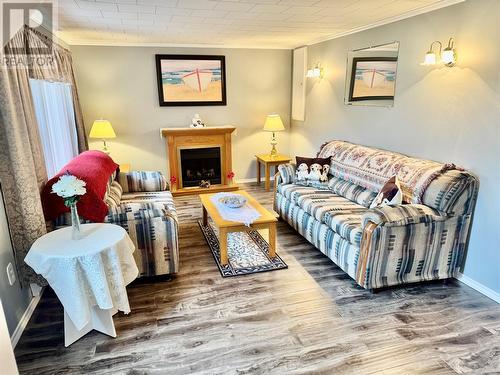 34A Main Road, Point La Haye, NL - Indoor Photo Showing Living Room With Fireplace