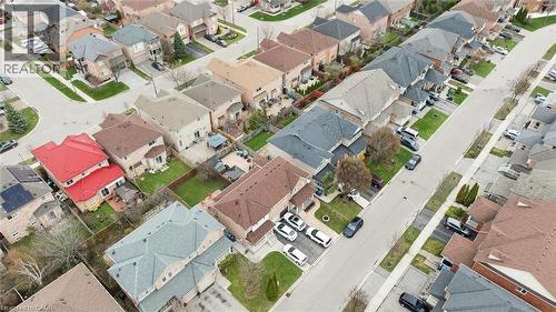Residential neighborhood featuring a grid street pattern, detached homes with varying roof colors, and paved driveways - 5449 Rochelle Way, Mississauga, ON - Other