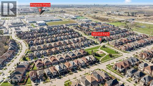 Aerial overview showcasing a residential development with multiple detached and semi-detached properties - 5449 Rochelle Way, Mississauga, ON - Outdoor With View