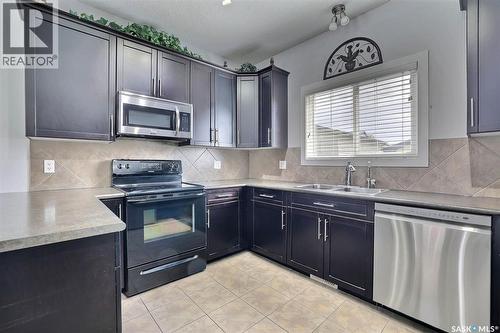 3314 Green Moss Lane, Regina, SK - Indoor Photo Showing Kitchen With Double Sink