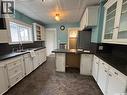 617 Bison Avenue, Weyburn, SK  - Indoor Photo Showing Kitchen With Double Sink 