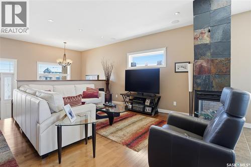 4150 Goldfinch Way, Regina, SK - Indoor Photo Showing Living Room With Fireplace