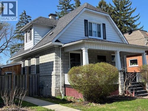 Traditional residence featuring a covered front porch with columnar supports - 838 Moore Street, Cambridge, ON - Outdoor With Deck Patio Veranda