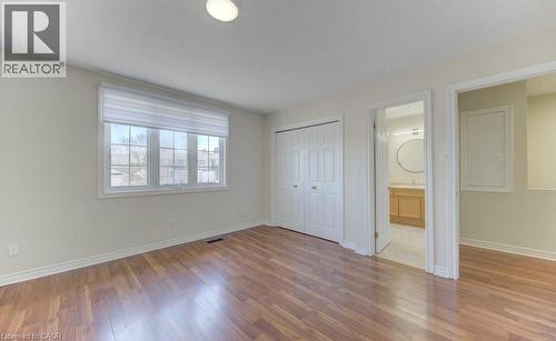 primary bedroom with ensuite privilege - 90 Ralgreen Crescent, Kitchener, ON - Indoor Photo Showing Other Room