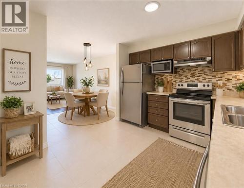 virtually staged - 90 Ralgreen Crescent, Kitchener, ON - Indoor Photo Showing Kitchen With Double Sink