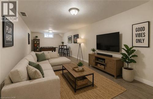 virtually staged - 90 Ralgreen Crescent, Kitchener, ON - Indoor Photo Showing Living Room