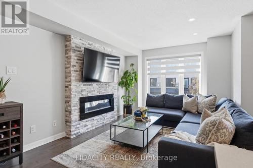807 Element Private, Ottawa, ON - Indoor Photo Showing Living Room With Fireplace
