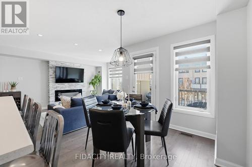 807 Element Private, Ottawa, ON - Indoor Photo Showing Dining Room With Fireplace