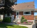 Brick exterior with a brown shingled roof - 129 Broker Drive, Hamilton, ON  - Outdoor 
