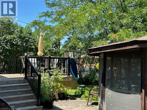 Multi-level wood deck featuring black metal railings and stairs - 129 Broker Drive, Hamilton, ON - Outdoor