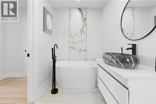 Bathroom featuring a freestanding bath and vanity - 17 Clearview Drive, Hamilton, ON - Indoor