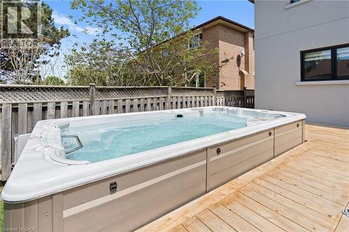 Wooden terrace with a hot tub - 17 Clearview Drive, Hamilton, ON - Outdoor With Exterior