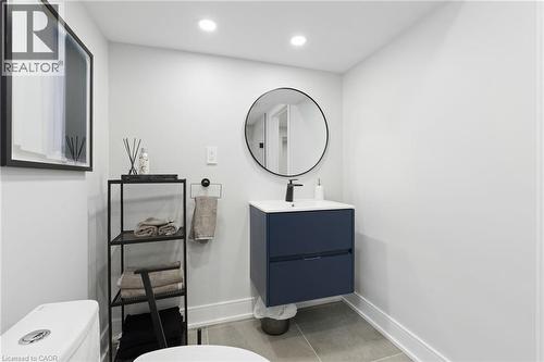 Bathroom featuring vanity, light tile patterned flooring, and recessed lighting - 17 Clearview Drive, Hamilton, ON - Indoor Photo Showing Bathroom