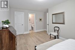 Primary bedroom with ensuite and walk in closet - 