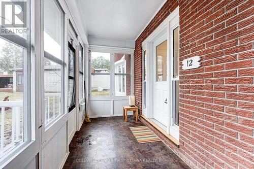Classic enclosed porch welcomes you home - 12 Glenview Crescent, Perth, ON - Indoor Photo Showing Other Room