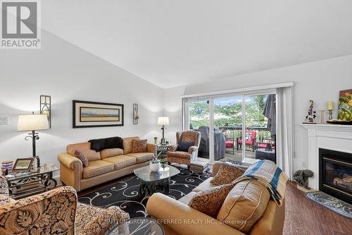 41 - 43 Capulet Walk, London North (North M), ON - Indoor Photo Showing Living Room With Fireplace
