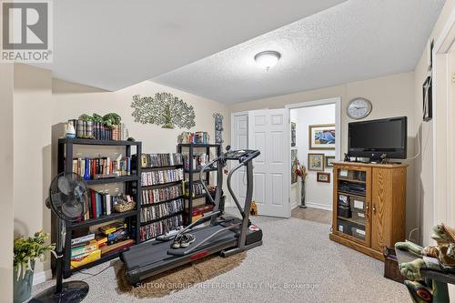 Lower Hallway - 41 - 43 Capulet Walk, London North (North M), ON - Indoor Photo Showing Gym Room