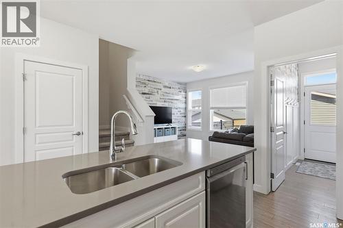 243 Newton Link, Saskatoon, SK - Indoor Photo Showing Kitchen With Double Sink