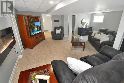 215 Orell St, Garson, ON - Indoor Photo Showing Living Room With Fireplace