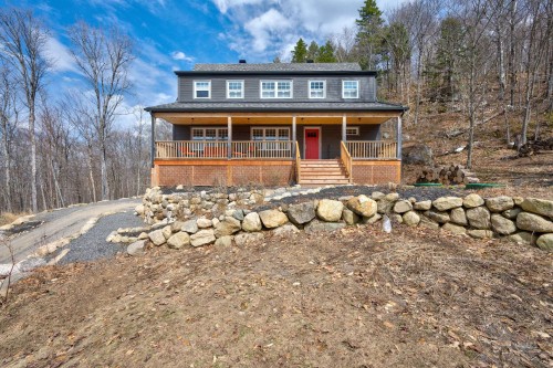 Façade - 155 Ch. De La Corniche, Mont-Tremblant, QC - Outdoor With Deck Patio Veranda
