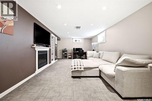 3013 Grant Road, Regina, SK - Indoor Photo Showing Living Room With Fireplace