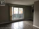 sliding glass door opening to a private balcony - 81 E Charlton Avenue E Unit# 904, Hamilton, ON  - Indoor Photo Showing Other Room 