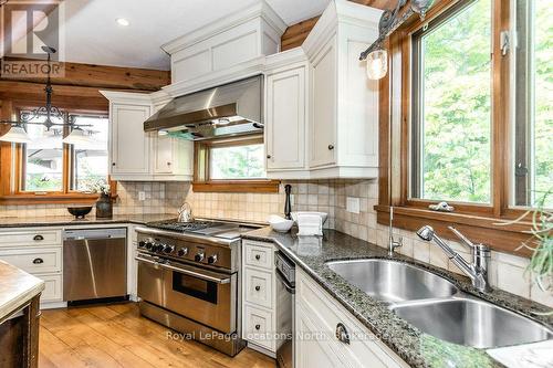 100 Melissa Lane, Tiny, ON - Indoor Photo Showing Kitchen With Double Sink
