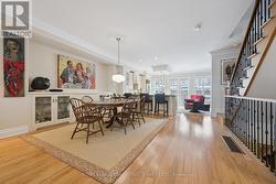 Dining Area Features Custom Built-In Cabinetry - 