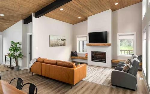 56 3 Mooswa Drive E, Onanole, MB - Indoor Photo Showing Living Room With Fireplace