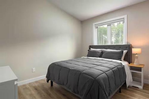 56 3 Mooswa Drive E, Onanole, MB - Indoor Photo Showing Bedroom