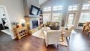 244 Boulder Creek, Cranbrook, BC  - Indoor Photo Showing Living Room With Fireplace 