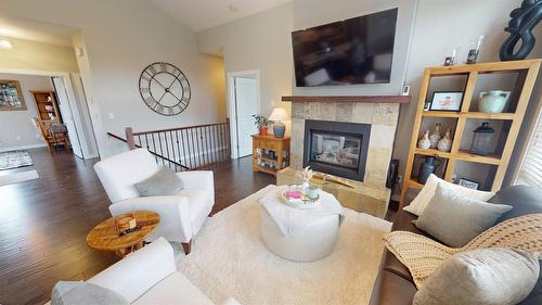 244 Boulder Creek, Cranbrook, BC - Indoor Photo Showing Living Room With Fireplace