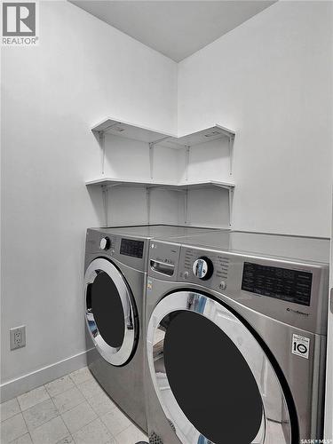 211 Stilling Union, Saskatoon, SK - Indoor Photo Showing Laundry Room