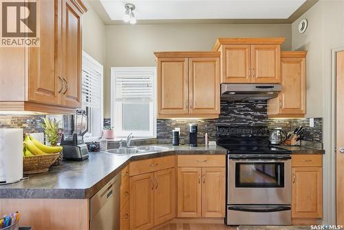 307 Van Impe Court, Saskatoon, SK - Indoor Photo Showing Kitchen With Double Sink