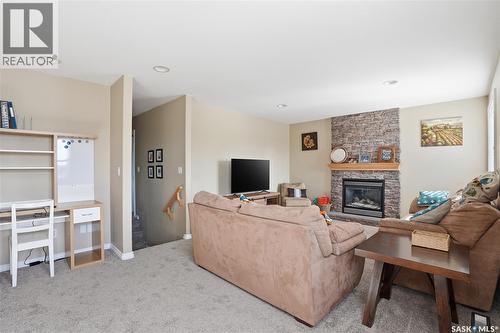 307 Van Impe Court, Saskatoon, SK - Indoor Photo Showing Living Room With Fireplace