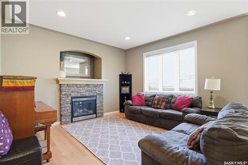 307 Van Impe Court, Saskatoon, SK - Indoor Photo Showing Living Room With Fireplace
