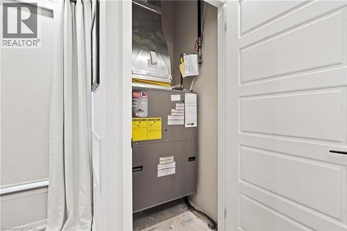 Utility room featuring heating unit - 3998 Victoria Avenue Unit# 105, Lincoln, ON - Indoor