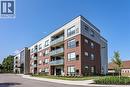 View of apartment building / complex - 3998 Victoria Avenue Unit# 105, Lincoln, ON  - Outdoor With Facade 