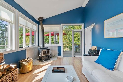7660 Lichen Road, Anglemont, BC - Indoor With Fireplace